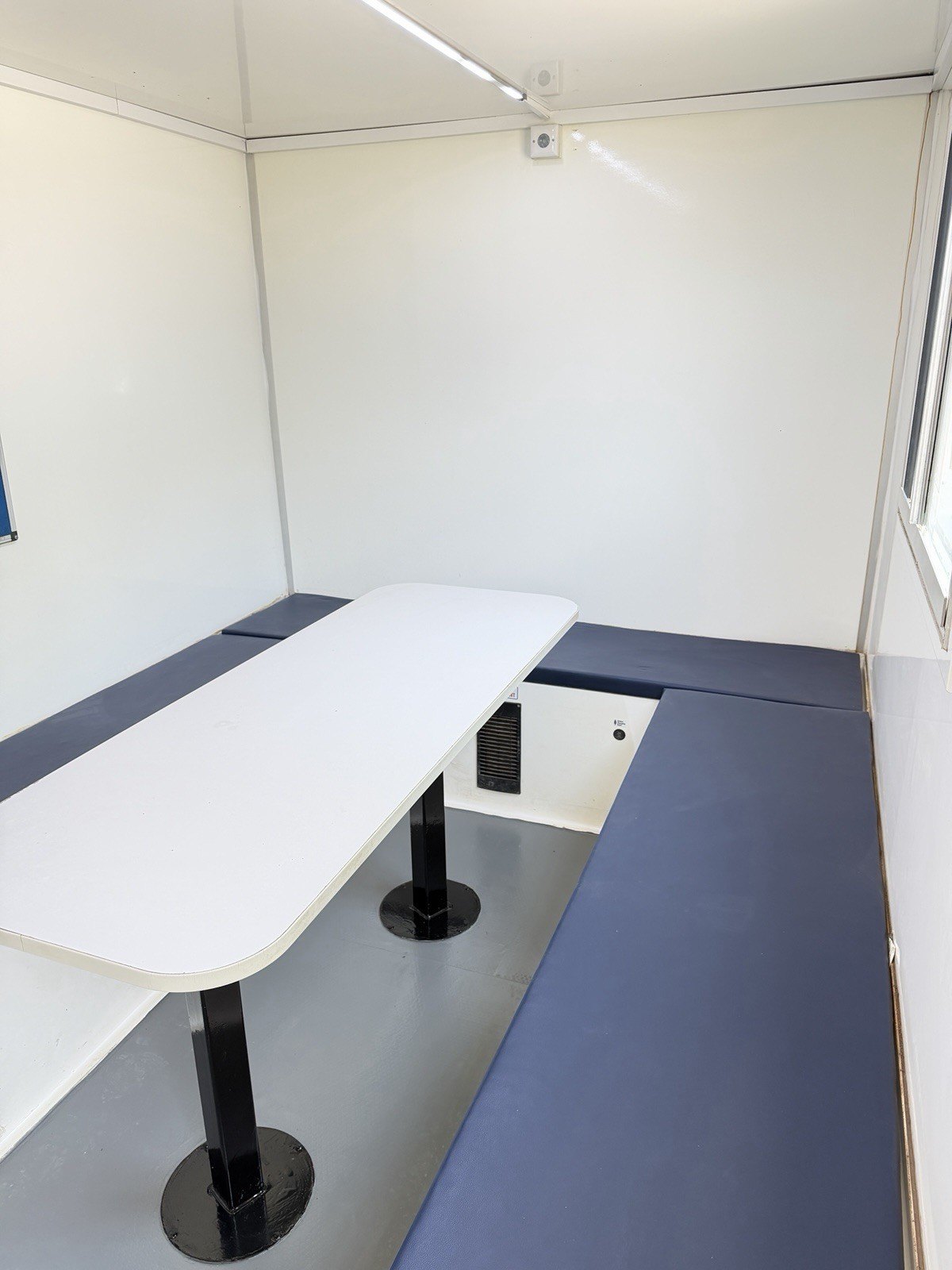 Canteen seating for twelve inside the BOXD 20ft welfare unit