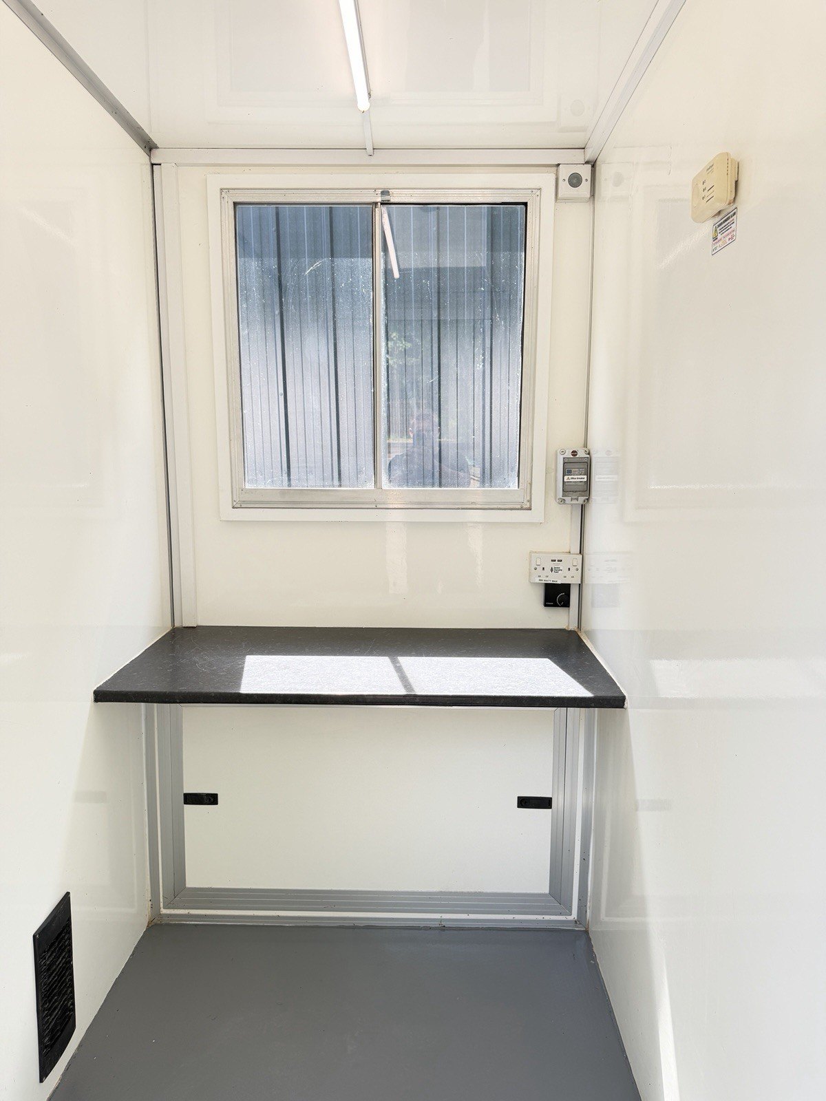Separate office with desk inside the BOXD 20ft welfare unit