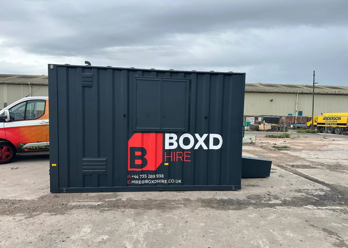 BOXD Hire 12ft welfare unit in BOXD livery, sited on a compound in County Durham